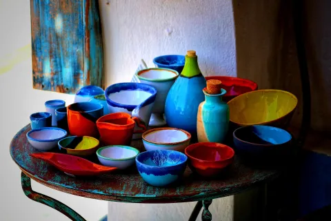 Painted pottery on a table. 
