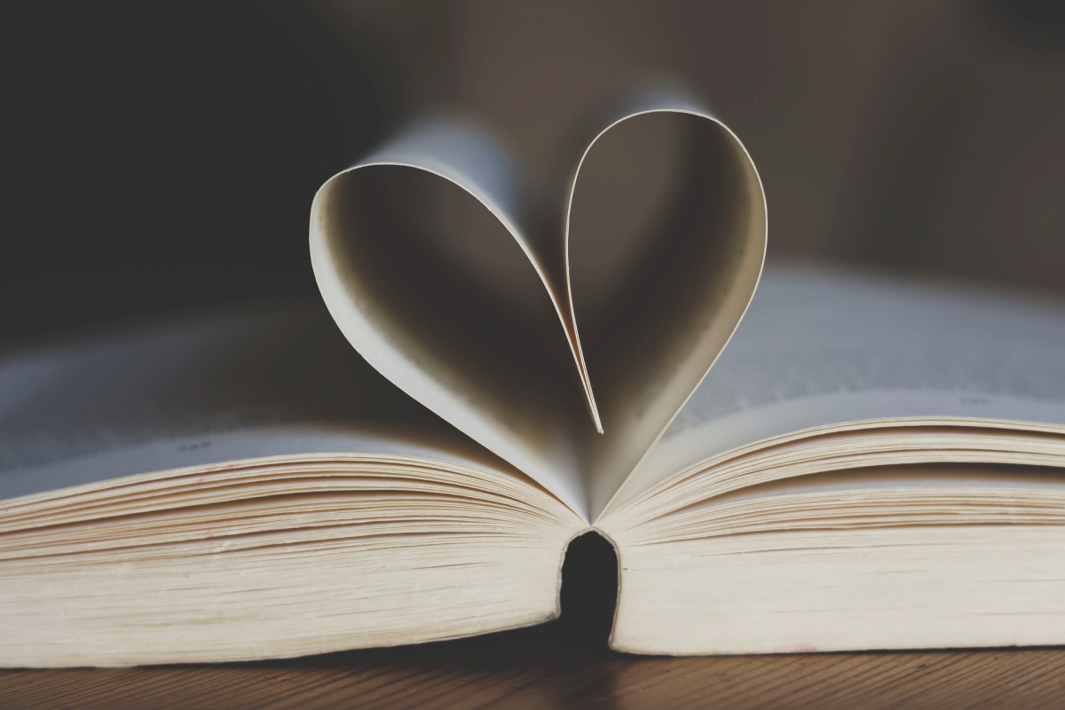Open book with heart shaped pages.